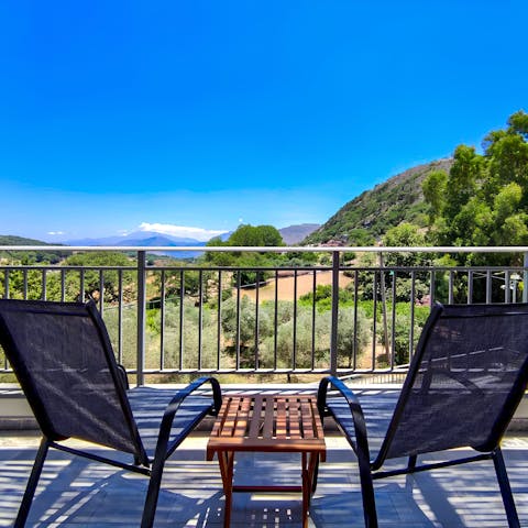 Enjoy a glass of wine as you soak up mountain views from the terrace
