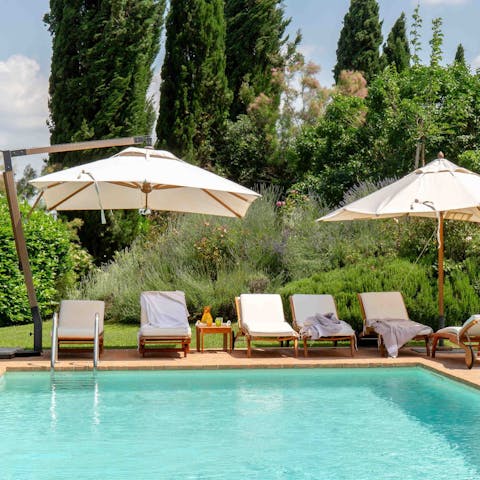 Take advantage of the Tuscan sunshine as you lounge poolside