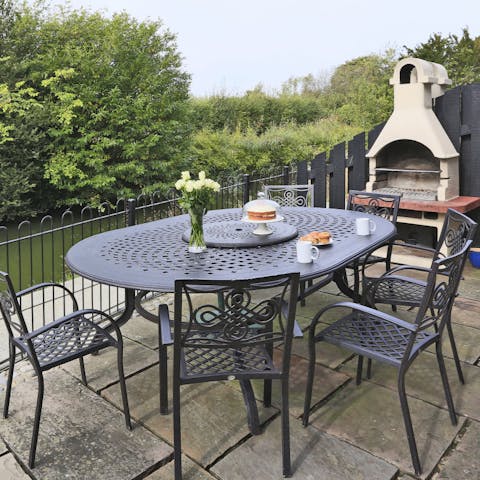 Sit out by the moat and fire up the barbecue