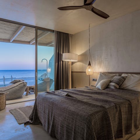 Wake up early and watch the sun rise over the horizon