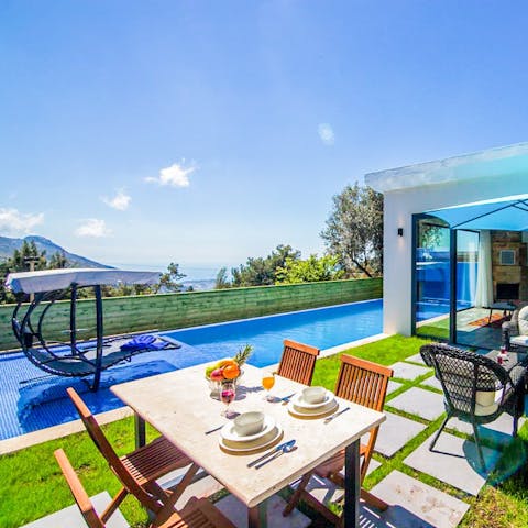 Relax, sunbathe, or swim in the outdoor pool