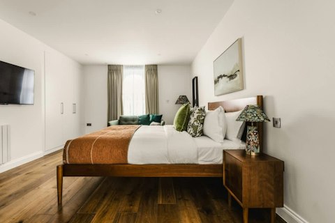 Sink into a king-size bed dressed in earthy, textured layers