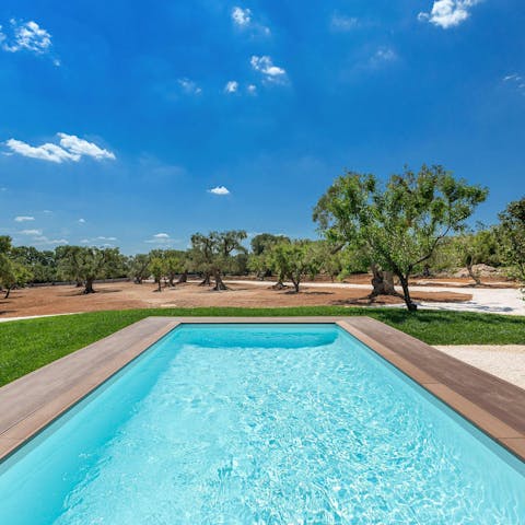 Swim in the private pool as the sun warms your skin