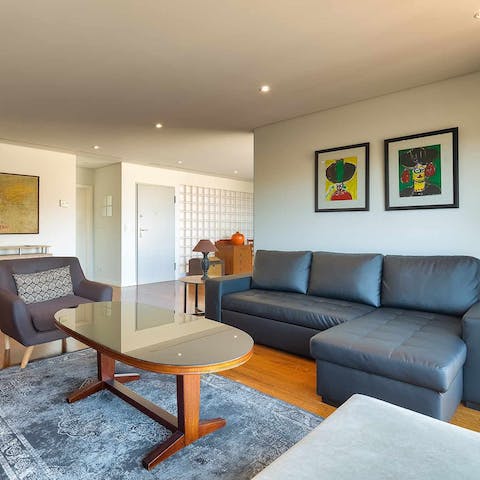 Relax with a good book in the cosy lounge area, adorned with unique artwork