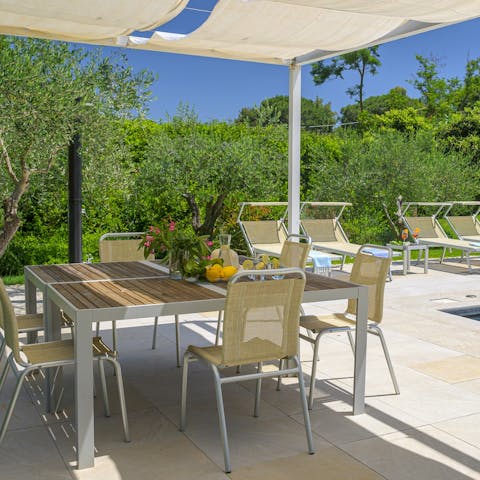 Organise an alfresco feast on the white patio