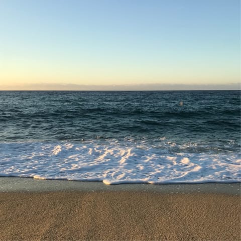 Walk just metres to Spiaggia di Straccoligno
