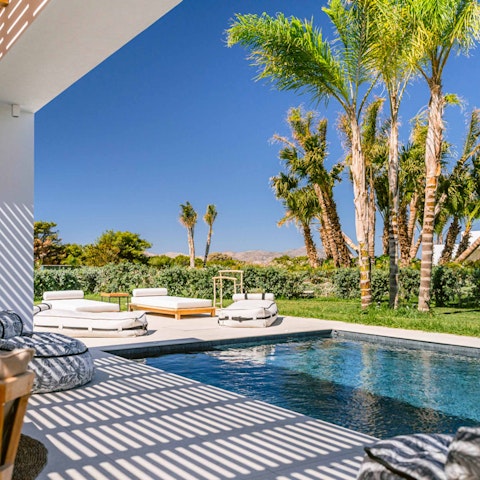 Swim some lengths of the private outdoor pool, or relax on a beanbag lounger