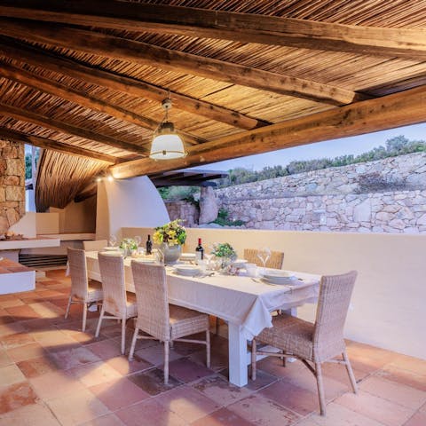 Feast on fresh seafood in the outdoor kitchen and dining space