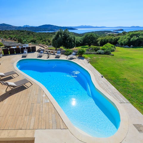 Drink in glorious views of the Mediterranean Sea from the poolside