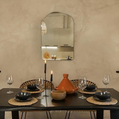 Share memorable meals together on the fiber-thatched dining set