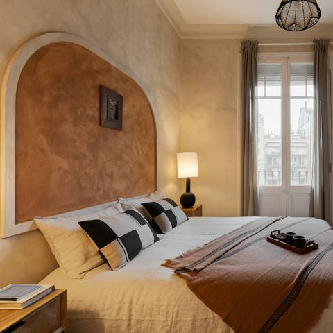 Wake up blissfully to the terracotta-hued arch above your head and soft breeze through your doors