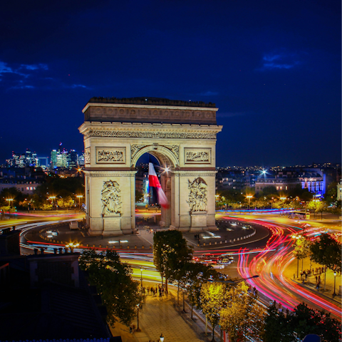Discover the Arc de Triomphe, an eighteen-minute drive away