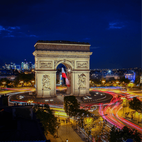 Discover the Arc de Triomphe, an eighteen-minute drive away