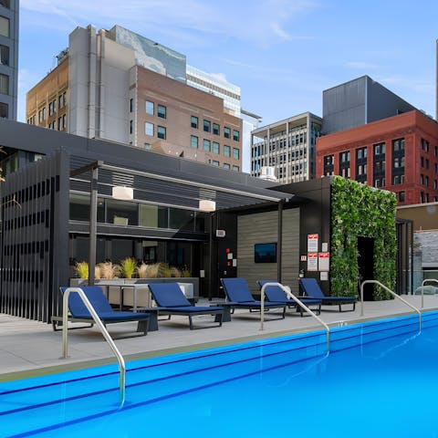 Swim laps in the sleek rooftop pool