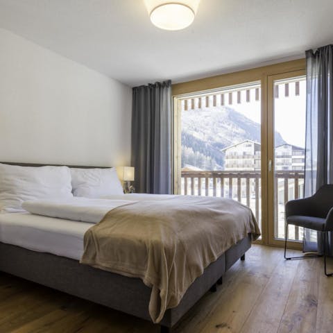 Wake up to views of the Swiss Alps out of your bedroom window