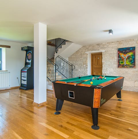 Challenge all comers to games of pool and darts in the games room