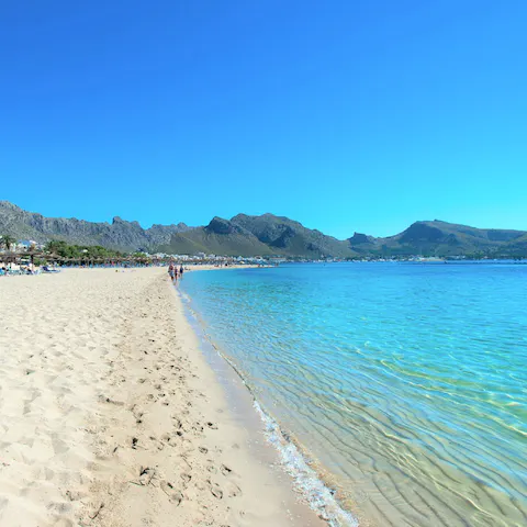 Bask in the warm sunshine on Can Cap de Bou Beach, a short drive away
