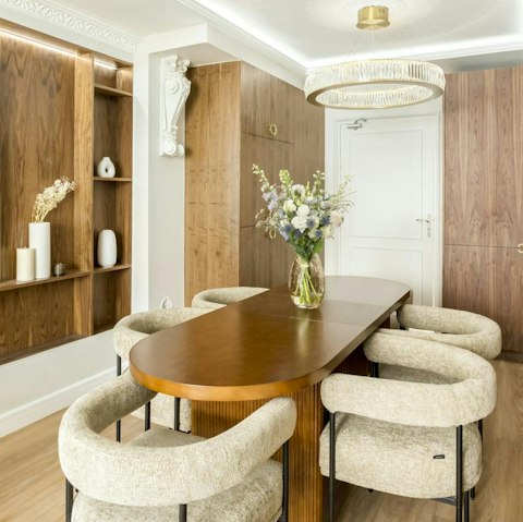 Enjoy a sociable meal at the dining table, cooked by a private chef