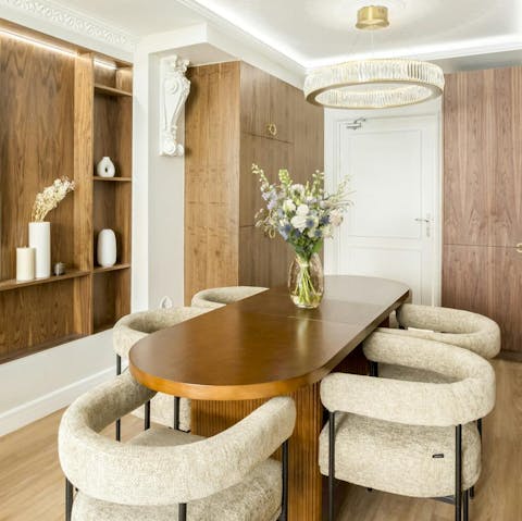 Enjoy a sociable meal at the dining table, cooked by a private chef