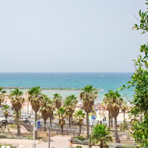 Sunbathe on the golden sands of the beach, just a two-minute walk from your home