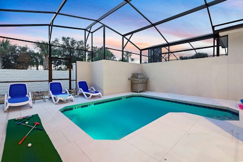 Cool off in the pool as a Florida sunset unfolds overhead