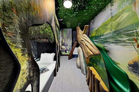 Transport little ones to a fantasy forest complete with a built-in slide