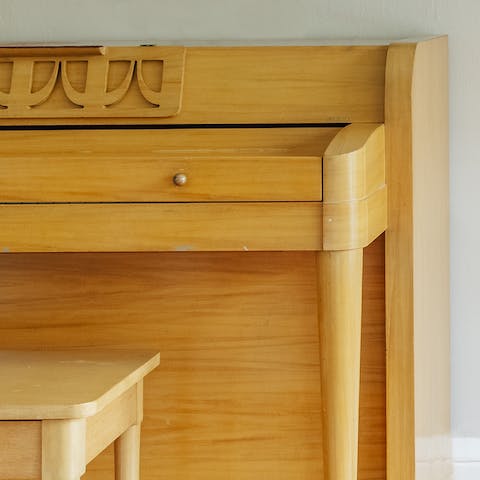 Have a sing-a-long around the mid-century style piano