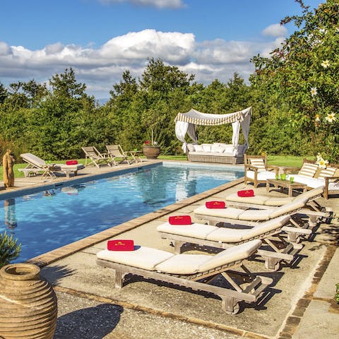 Relax in the Tuscan sun before cooling down in the pool