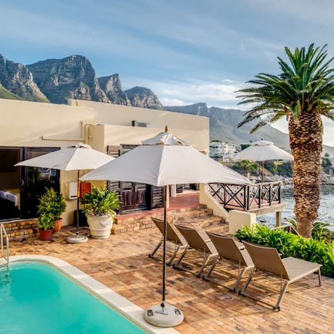 Watch the changing tides from the sunloungers – preferably with a cocktail in hand