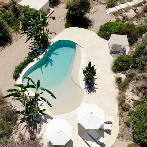 Enjoy a refreshing swim in the outdoor pool