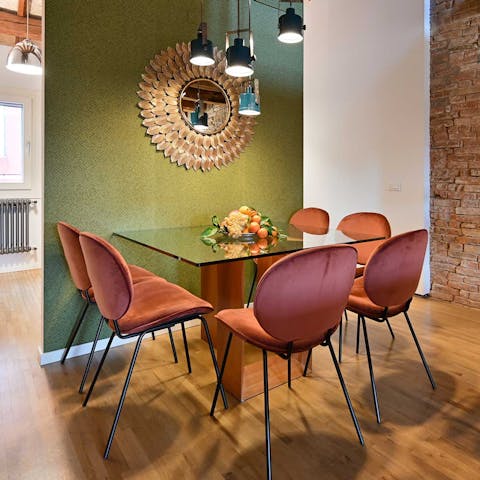 Dine on traditional Italian food at the table