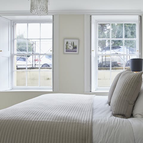 Admire the home's character features – sash windows and vaulted ceilings in the bathroom and kitchen