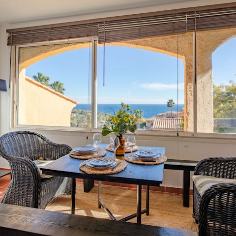 Unwind over dinner with views of the ocean