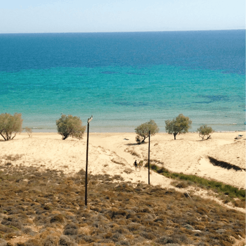 Take the two-minute walk down to the empty beach in front of the villa