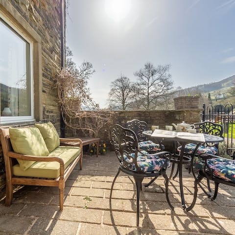 Enjoy a cup of coffee or glass of wine on the patio overlooking the countryside