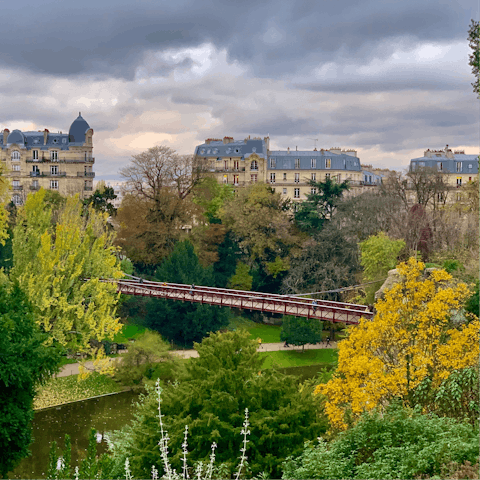 Take an afternoon stroll through Parc des Buttes-Chaumont, ten minutes away on foot