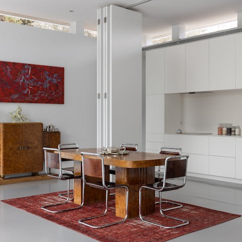 Serve up some local Portuguese food at the stylish dining area