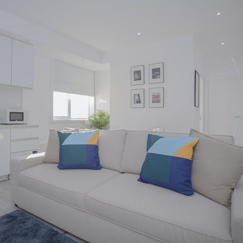 Stretch out in the living area after a day of soaking up the city