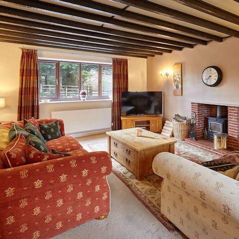 Sink into the cosy sofas for a movie night by the crackling fire
