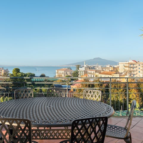 Enjoy a glass of wine with a view of Mt Vesuvius