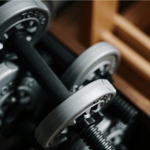 Start the day with an invigorating workout on the Peloton bike in the on-site gym