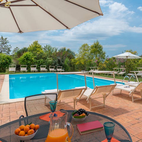 Enjoy breakfast after taking a dip in the private pool