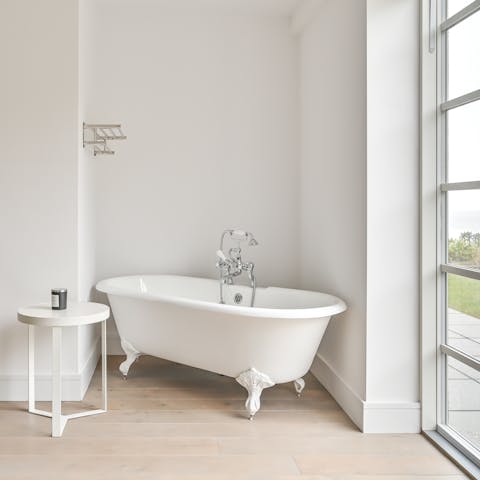 Light a candle and unwind with a soak in the Victorian bathtub