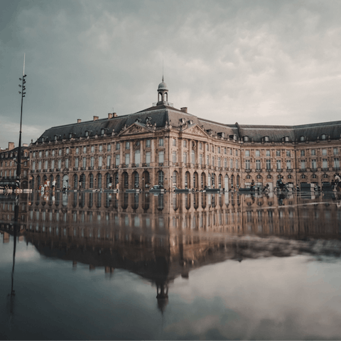 Visit the iconic Place de la Bourse, a short walk away
