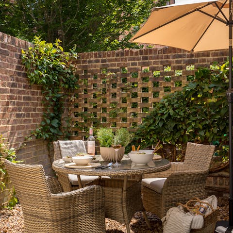 Retreat to the secluded garden to relax in the English sunshine