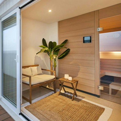 Indulge in the wellness centre with treatment room and sauna