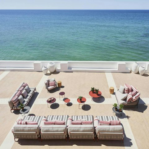 Soak up the sun on your private terrace overlooking the sea