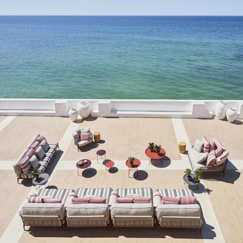 Soak up the sun on your private terrace overlooking the sea