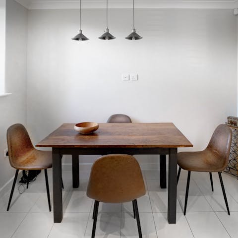 Challenge your loved ones to a game of chess around the stylish games table