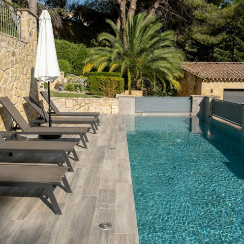 Relax in the French sun next to the private pool